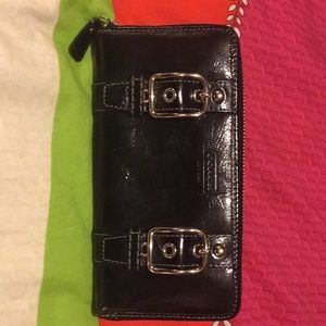 Lrg. Black patent leather coach wallet.